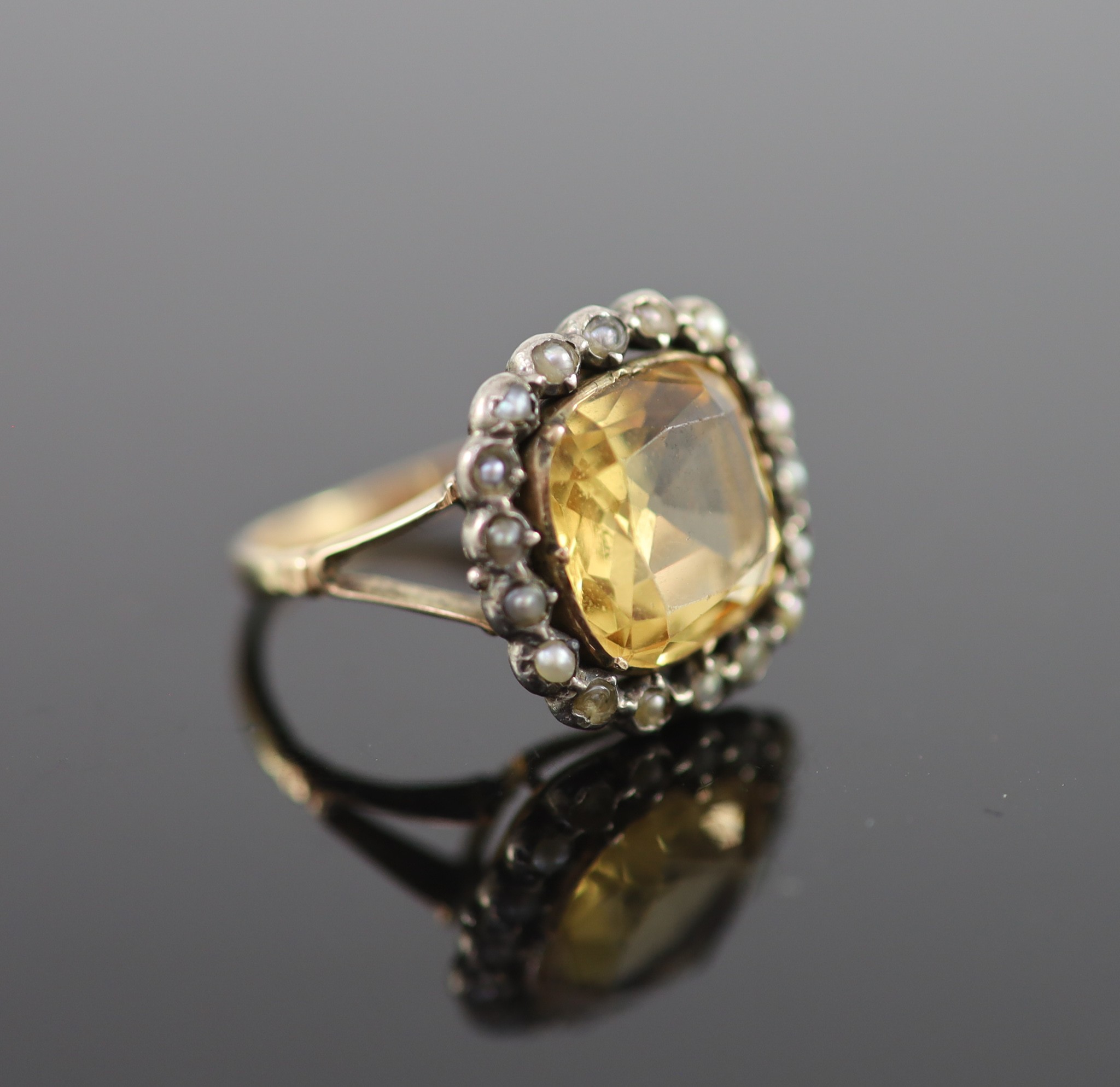 A 19th century gold, citrine and seed pearl set shaped square cluster ring